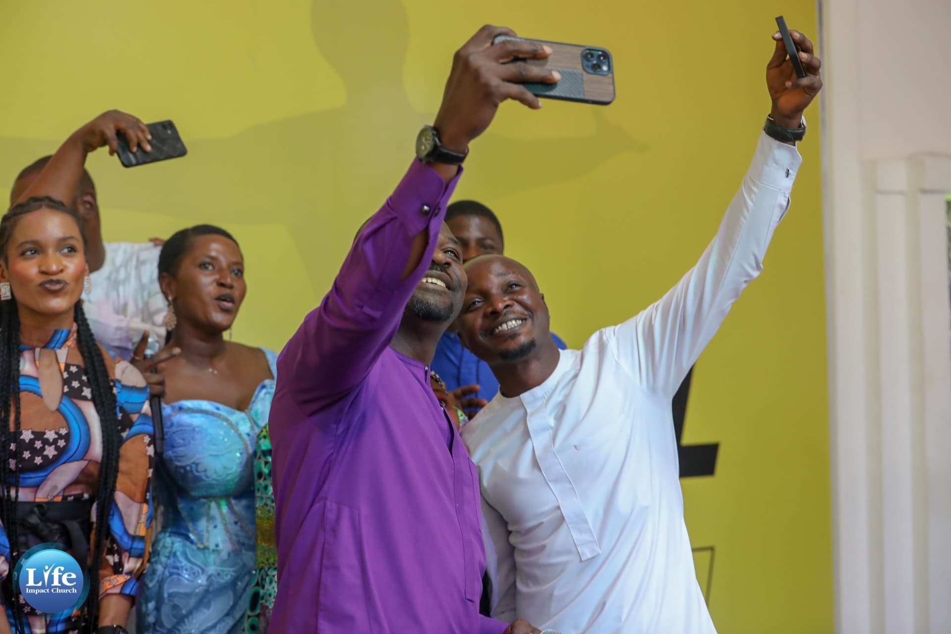 Members taking a selfie together